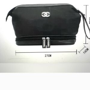CHANEL Black Bag Double Zipper with Iconic CC Logos